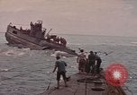 Image of USS Cod rescuing sailors from dutch submarine, O-19 Pacific Ocean, 1945, second 7 stock footage video 65675076084