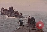 Image of USS Cod rescuing sailors from dutch submarine, O-19 Pacific Ocean, 1945, second 10 stock footage video 65675076084