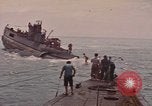 Image of USS Cod rescuing sailors from dutch submarine, O-19 Pacific Ocean, 1945, second 11 stock footage video 65675076084