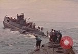 Image of USS Cod rescuing sailors from dutch submarine, O-19 Pacific Ocean, 1945, second 14 stock footage video 65675076084