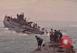 Image of USS Cod rescuing sailors from dutch submarine, O-19 Pacific Ocean, 1945, second 15 stock footage video 65675076084