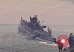 Image of USS Cod rescuing sailors from dutch submarine, O-19 Pacific Ocean, 1945, second 18 stock footage video 65675076084