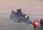 Image of USS Cod rescuing sailors from dutch submarine, O-19 Pacific Ocean, 1945, second 20 stock footage video 65675076084