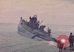 Image of USS Cod rescuing sailors from dutch submarine, O-19 Pacific Ocean, 1945, second 21 stock footage video 65675076084