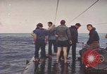 Image of USS Cod rescuing sailors from dutch submarine, O-19 Pacific Ocean, 1945, second 22 stock footage video 65675076084