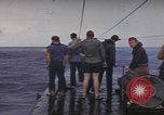 Image of USS Cod rescuing sailors from dutch submarine, O-19 Pacific Ocean, 1945, second 23 stock footage video 65675076084