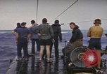 Image of USS Cod rescuing sailors from dutch submarine, O-19 Pacific Ocean, 1945, second 26 stock footage video 65675076084