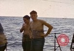 Image of USS Cod rescuing sailors from dutch submarine, O-19 Pacific Ocean, 1945, second 27 stock footage video 65675076084