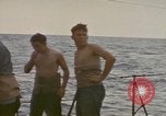 Image of USS Cod rescuing sailors from dutch submarine, O-19 Pacific Ocean, 1945, second 28 stock footage video 65675076084