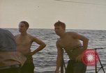Image of USS Cod rescuing sailors from dutch submarine, O-19 Pacific Ocean, 1945, second 31 stock footage video 65675076084