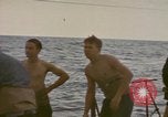 Image of USS Cod rescuing sailors from dutch submarine, O-19 Pacific Ocean, 1945, second 32 stock footage video 65675076084