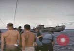 Image of USS Cod rescuing sailors from dutch submarine, O-19 Pacific Ocean, 1945, second 35 stock footage video 65675076084