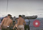 Image of USS Cod rescuing sailors from dutch submarine, O-19 Pacific Ocean, 1945, second 36 stock footage video 65675076084