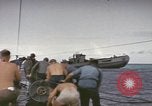 Image of USS Cod rescuing sailors from dutch submarine, O-19 Pacific Ocean, 1945, second 37 stock footage video 65675076084