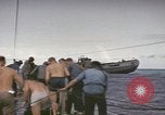 Image of USS Cod rescuing sailors from dutch submarine, O-19 Pacific Ocean, 1945, second 38 stock footage video 65675076084