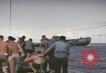 Image of USS Cod rescuing sailors from dutch submarine, O-19 Pacific Ocean, 1945, second 39 stock footage video 65675076084