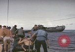 Image of USS Cod rescuing sailors from dutch submarine, O-19 Pacific Ocean, 1945, second 40 stock footage video 65675076084