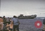 Image of USS Cod rescuing sailors from dutch submarine, O-19 Pacific Ocean, 1945, second 42 stock footage video 65675076084