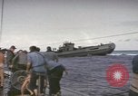 Image of USS Cod rescuing sailors from dutch submarine, O-19 Pacific Ocean, 1945, second 43 stock footage video 65675076084