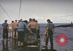 Image of USS Cod rescuing sailors from dutch submarine, O-19 Pacific Ocean, 1945, second 44 stock footage video 65675076084