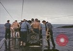 Image of USS Cod rescuing sailors from dutch submarine, O-19 Pacific Ocean, 1945, second 45 stock footage video 65675076084