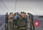 Image of USS Cod rescuing sailors from dutch submarine, O-19 Pacific Ocean, 1945, second 46 stock footage video 65675076084