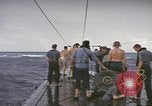 Image of USS Cod rescuing sailors from dutch submarine, O-19 Pacific Ocean, 1945, second 49 stock footage video 65675076084