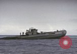 Image of USS Cod rescuing sailors from dutch submarine, O-19 Pacific Ocean, 1945, second 50 stock footage video 65675076084