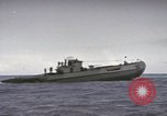 Image of USS Cod rescuing sailors from dutch submarine, O-19 Pacific Ocean, 1945, second 51 stock footage video 65675076084