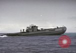 Image of USS Cod rescuing sailors from dutch submarine, O-19 Pacific Ocean, 1945, second 52 stock footage video 65675076084