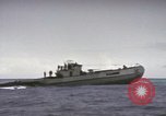 Image of USS Cod rescuing sailors from dutch submarine, O-19 Pacific Ocean, 1945, second 53 stock footage video 65675076084