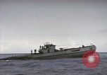 Image of USS Cod rescuing sailors from dutch submarine, O-19 Pacific Ocean, 1945, second 54 stock footage video 65675076084