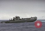 Image of USS Cod rescuing sailors from dutch submarine, O-19 Pacific Ocean, 1945, second 55 stock footage video 65675076084