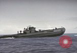 Image of USS Cod rescuing sailors from dutch submarine, O-19 Pacific Ocean, 1945, second 57 stock footage video 65675076084