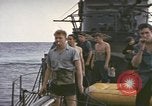 Image of USS Cod rescuing sailors from dutch submarine, O-19 Pacific Ocean, 1945, second 58 stock footage video 65675076084