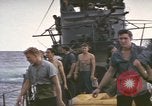 Image of USS Cod rescuing sailors from dutch submarine, O-19 Pacific Ocean, 1945, second 61 stock footage video 65675076084