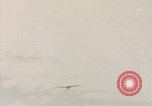 Image of Submarine, USS Cod, rescuing crew of Dutch submarine, O-19 Spratly Islands, 1945, second 9 stock footage video 65675076085