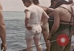 Image of Submarine, USS Cod, rescuing crew of Dutch submarine, O-19 Spratly Islands, 1945, second 19 stock footage video 65675076085