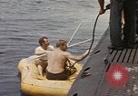 Image of Submarine, USS Cod, rescuing crew of Dutch submarine, O-19 Spratly Islands, 1945, second 22 stock footage video 65675076085