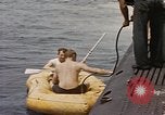 Image of Submarine, USS Cod, rescuing crew of Dutch submarine, O-19 Spratly Islands, 1945, second 24 stock footage video 65675076085
