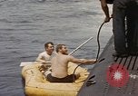 Image of Submarine, USS Cod, rescuing crew of Dutch submarine, O-19 Spratly Islands, 1945, second 26 stock footage video 65675076085