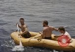 Image of Submarine, USS Cod, rescuing crew of Dutch submarine, O-19 Spratly Islands, 1945, second 27 stock footage video 65675076085