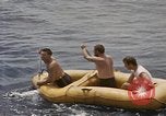 Image of Submarine, USS Cod, rescuing crew of Dutch submarine, O-19 Spratly Islands, 1945, second 28 stock footage video 65675076085