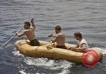 Image of Submarine, USS Cod, rescuing crew of Dutch submarine, O-19 Spratly Islands, 1945, second 29 stock footage video 65675076085