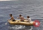 Image of Submarine, USS Cod, rescuing crew of Dutch submarine, O-19 Spratly Islands, 1945, second 33 stock footage video 65675076085