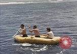 Image of Submarine, USS Cod, rescuing crew of Dutch submarine, O-19 Spratly Islands, 1945, second 34 stock footage video 65675076085