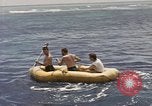 Image of Submarine, USS Cod, rescuing crew of Dutch submarine, O-19 Spratly Islands, 1945, second 35 stock footage video 65675076085