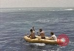 Image of Submarine, USS Cod, rescuing crew of Dutch submarine, O-19 Spratly Islands, 1945, second 37 stock footage video 65675076085