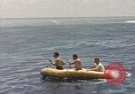 Image of Submarine, USS Cod, rescuing crew of Dutch submarine, O-19 Spratly Islands, 1945, second 39 stock footage video 65675076085