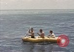 Image of Submarine, USS Cod, rescuing crew of Dutch submarine, O-19 Spratly Islands, 1945, second 40 stock footage video 65675076085